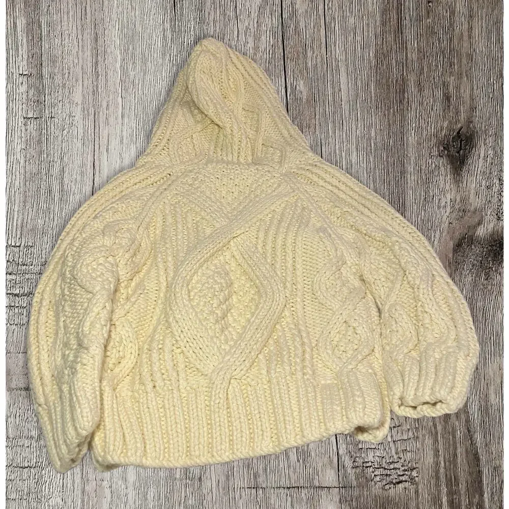 Gymboree cable knit baby’s sweater. 6-12 months. Color is cream